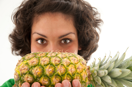 Image result for woman eating pineapple