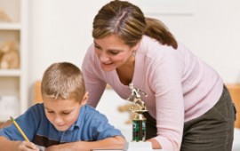 Mother giving directions to child about homework.